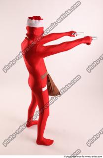 JOEL_ADAMSON CHRISTMAS VILLAIN WITH TWO GUNS